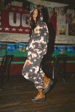 Load image into Gallery viewer, THE COW PRINT CUFFED SWEAT PANTS