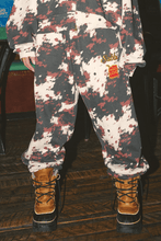 Load image into Gallery viewer, THE COW PRINT CUFFED SWEAT PANTS
